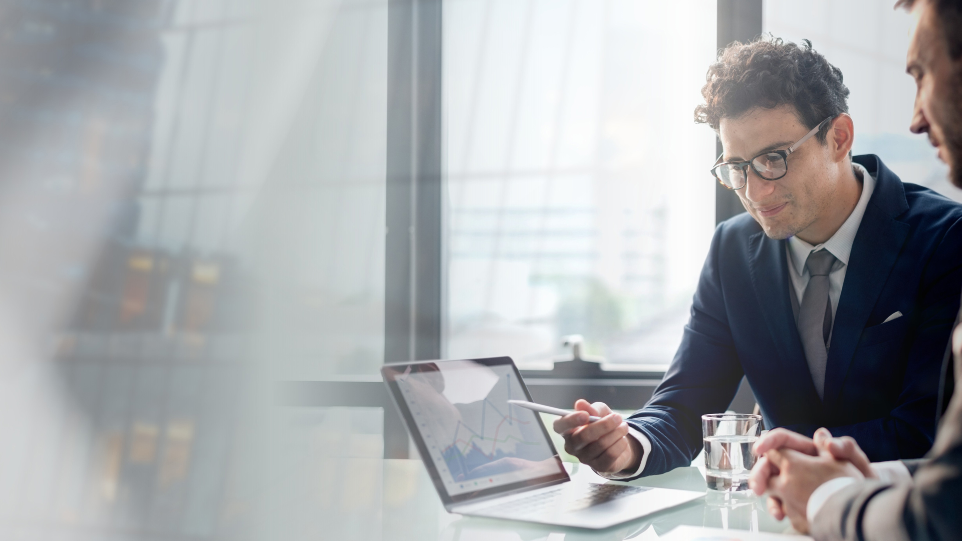 Business Meeting Analyzing Data Software